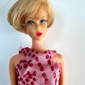 Vintage Barbie in Original dress with zipper.